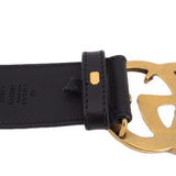 Black leather belt strap with stamped marking and gold buckle base