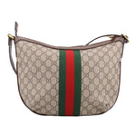 Brown GG canvas crossbody bag with centered green-red web stripe and gold GG clasp