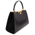 Black Tory Burch Eleanor satchel with top handle and gold logo clasp front