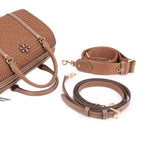 Brown satchel set accessories: detachable strap, wristlet strap, and small logo charm.
