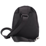 Black sling bag with adjustable shoulder strap and front top handle tab