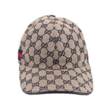 Beige GG monogram baseball cap with navy bill and red-blue web stripe on side