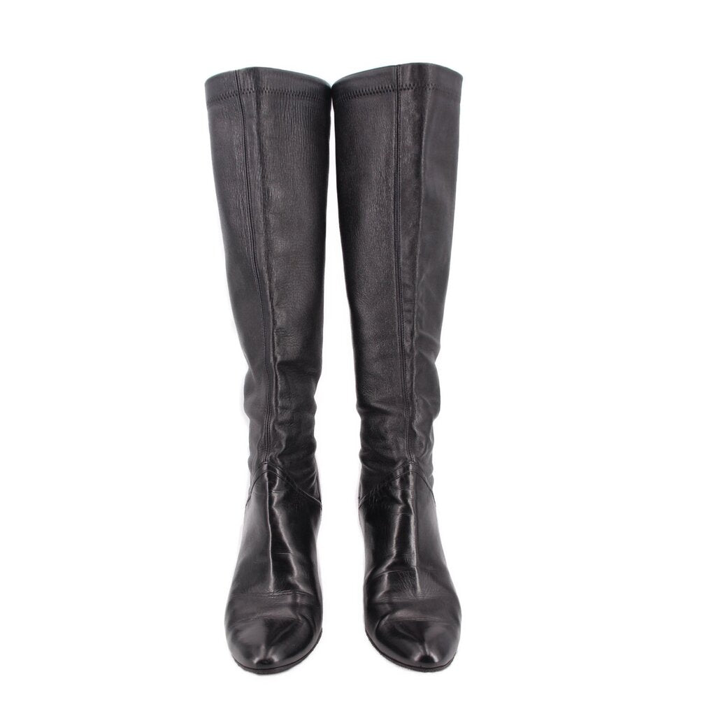 Pair of knee-high leather boots with pointed toe, black