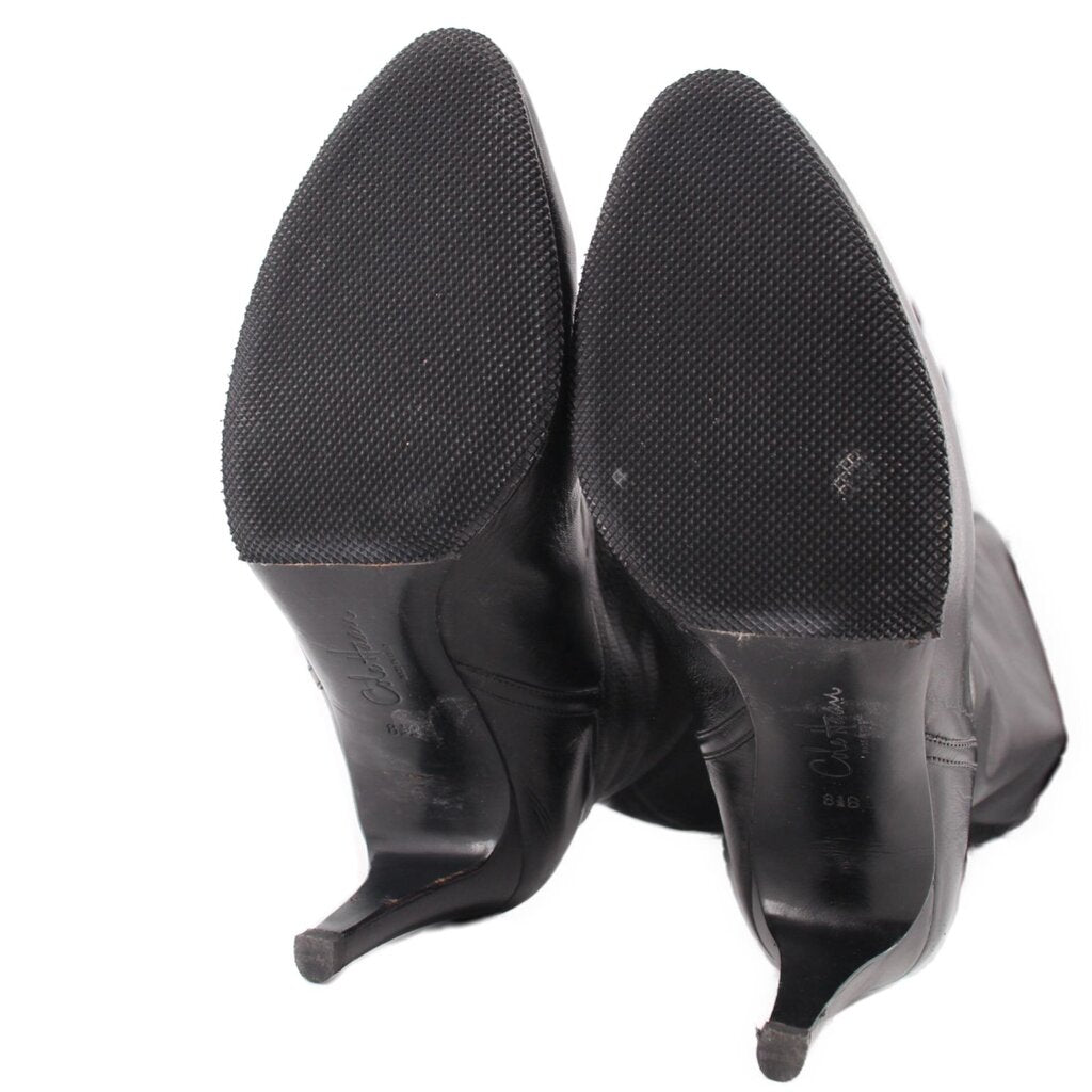 Knee-high leather boots with textured soles and stiletto heels, black