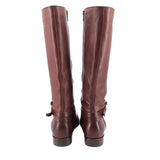 Brown leather knee-high boots viewed from back with zip and heel