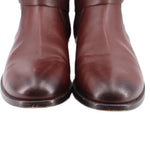 Close-up of brown leather boot toes and heels