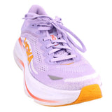 Purple lace-up running sneakers with orange trim and cushioned white sole