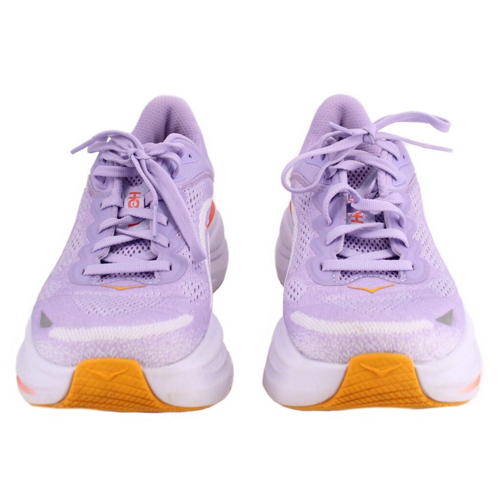 Pair of purple running sneakers, orange heel panels, lavender laces