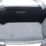 Black tote crossbody interior lining with top edge and metal clasp bar