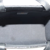 Black tote crossbody interior lining with top edge and metal clasp bar
