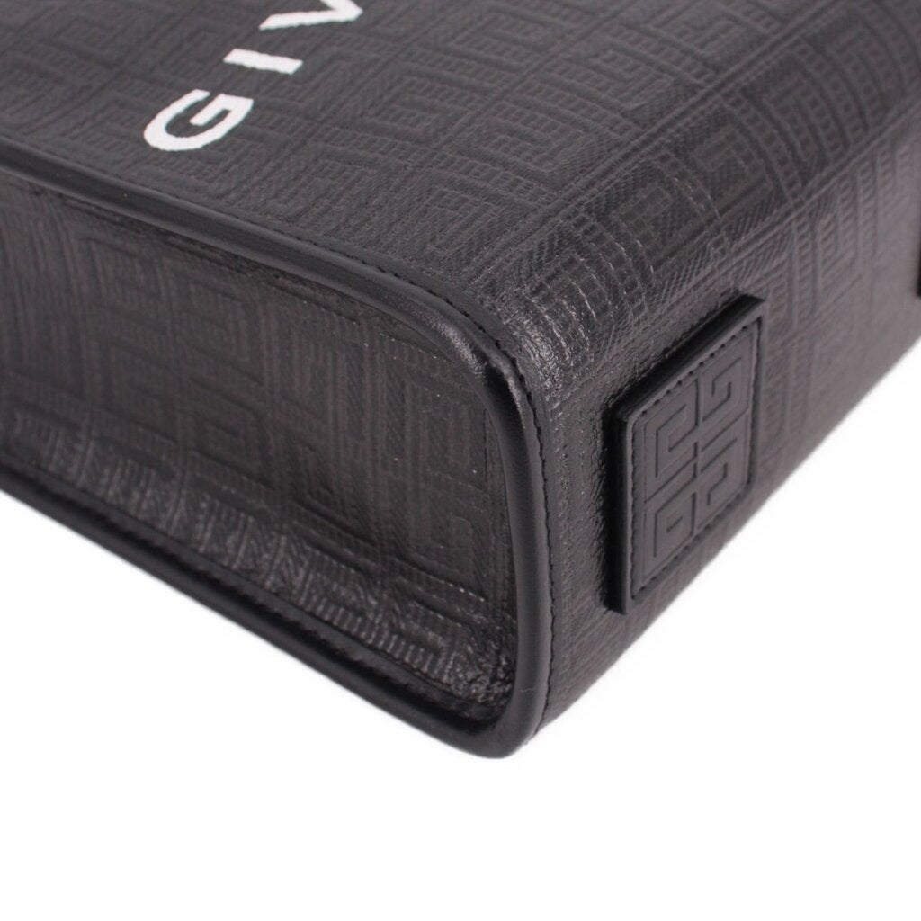 Black embossed leather tote corner with square patch and stitched edge