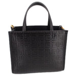 Black mini G tote crossbody with embossed monogram pattern and top handles