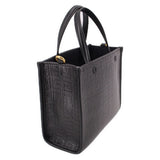 Black mini G tote crossbody with shoulder strap, gold hardware, and structured shape