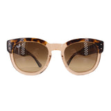 Ray-Ban oversized sunglasses with tortoiseshell brow and temples, pale beige frames, and brown gradient lenses
