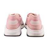 CHANEL mesh sneakers pair, rear view with padded heel and red lace eyelets