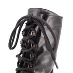 CHANEL black lace-up boot detail, calfskin laces with branded lace tabs