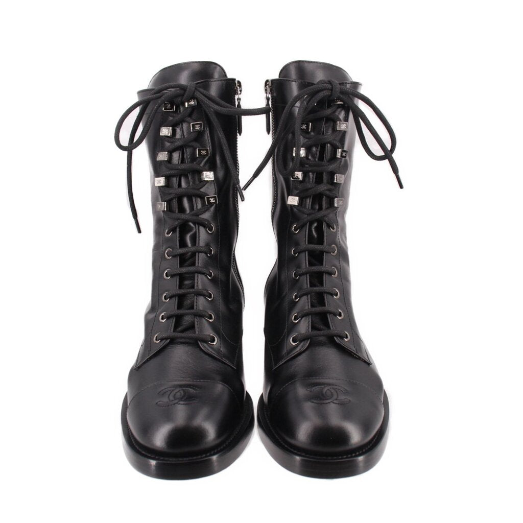 CHANEL black lace-up combat boots pair, calfskin uppers with front laces