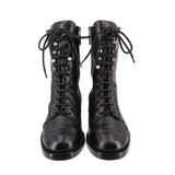 CHANEL black lace-up combat boots pair, calfskin uppers with front laces