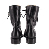 CHANEL black lace-up combat boots, back view with heel and lace loops