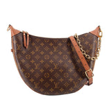 Monogram hobo crossbody bag with tan leather trim and gold hardware