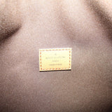 Interior label reading 'LOUIS VUITTON PARIS' and 'made in Italy'