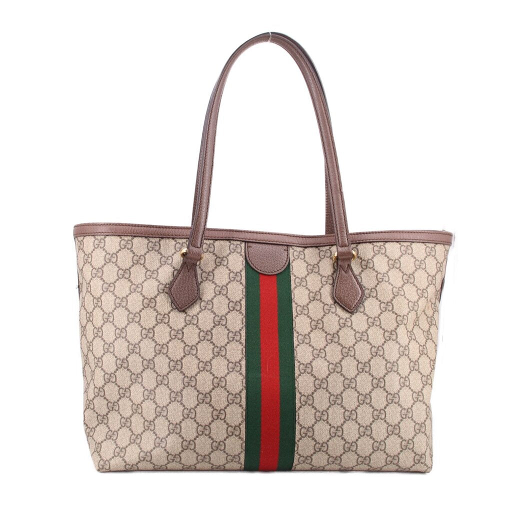 Large tote bag with brown handles, beige GG canvas, and centered green-red web stripe
