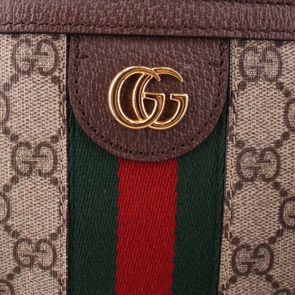 Tote bag front close-up with GG logo patch and green-red web stripe insert