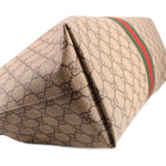 Tote bag close-up of folded end in beige GG canvas with green-red web stripe