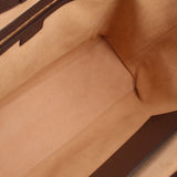 Tote bag interior lining with smooth tan leather panels