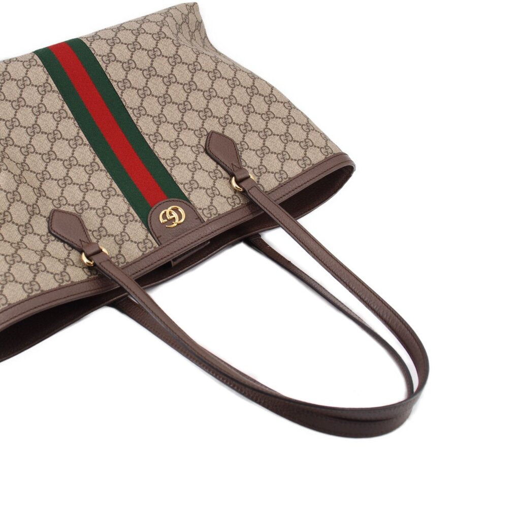 Large brown GG canvas tote with green-red stripe and leather top handles