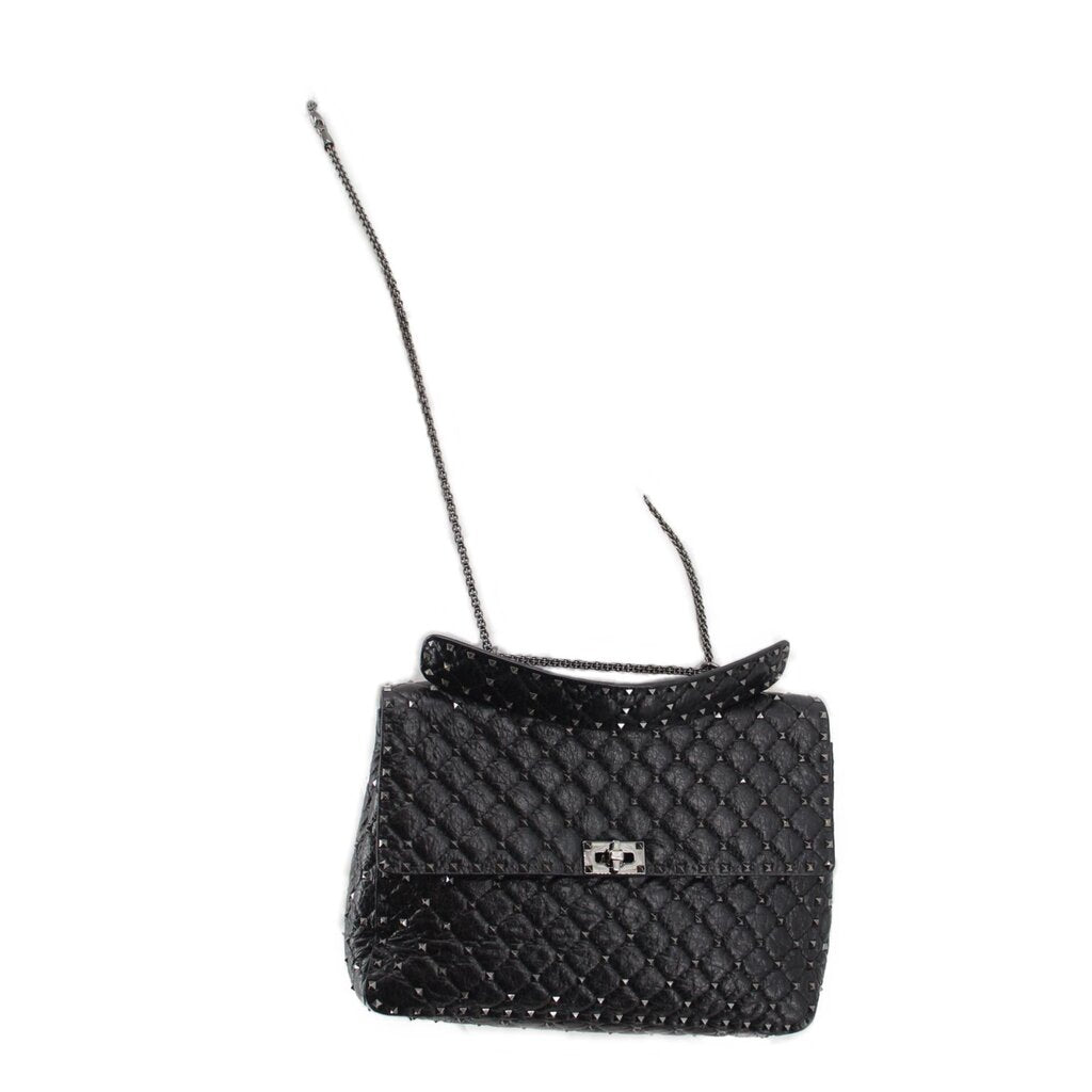 Black quilted Rockstud shoulder bag with chain strap and flap push-lock