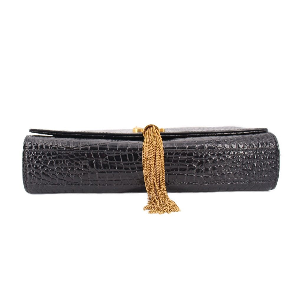 Black croc-embossed flap crossbody bag with gold tassel pull