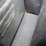 Croc-embossed lining and stitched seam detail inside the flap