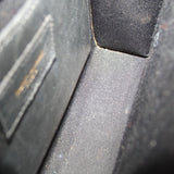 Croc-embossed lining and stitched seam detail inside the flap