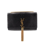 Black croc-embossed crossbody bag with gold YSL clasp and tassel detail