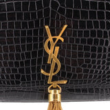 Black croc-embossed flap with gold YSL emblem and tassel hardware