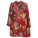 Red floral button-up jacket with pointed collar and long sleeves