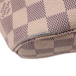 Damier Azur zip pouch bottom edge with LV stamp on check fabric