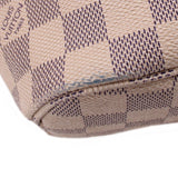 Damier Azur zip pouch bottom edge with LV stamp on check fabric