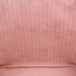 Pink striped fabric lining inside the tote bag