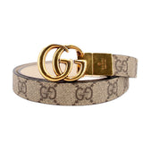 GG monogram canvas belt in tan with gold double-G buckle and keeper