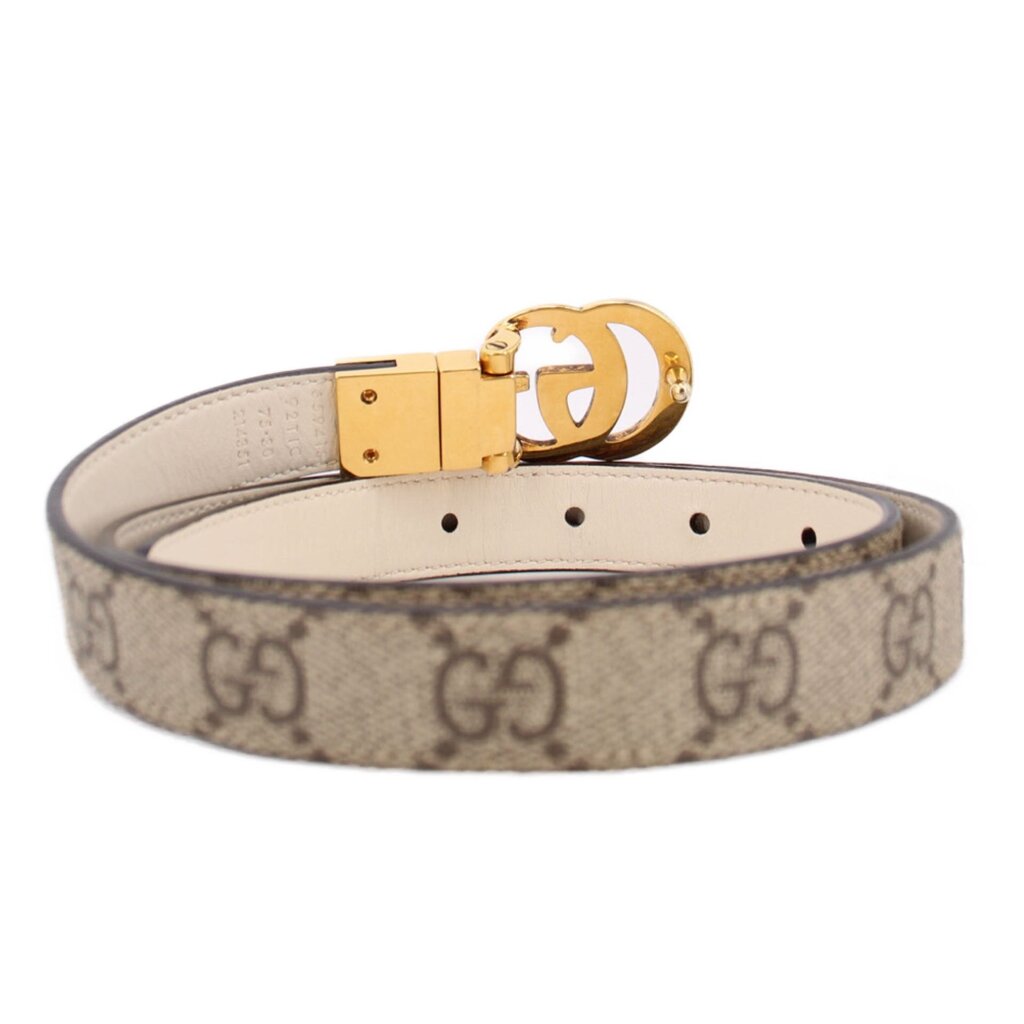 Tan GG monogram belt with gold buckle and beige interior lining with holes