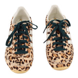 Pair of ADIDAS leopard calf hair sneakers, front view, dark green lace-up