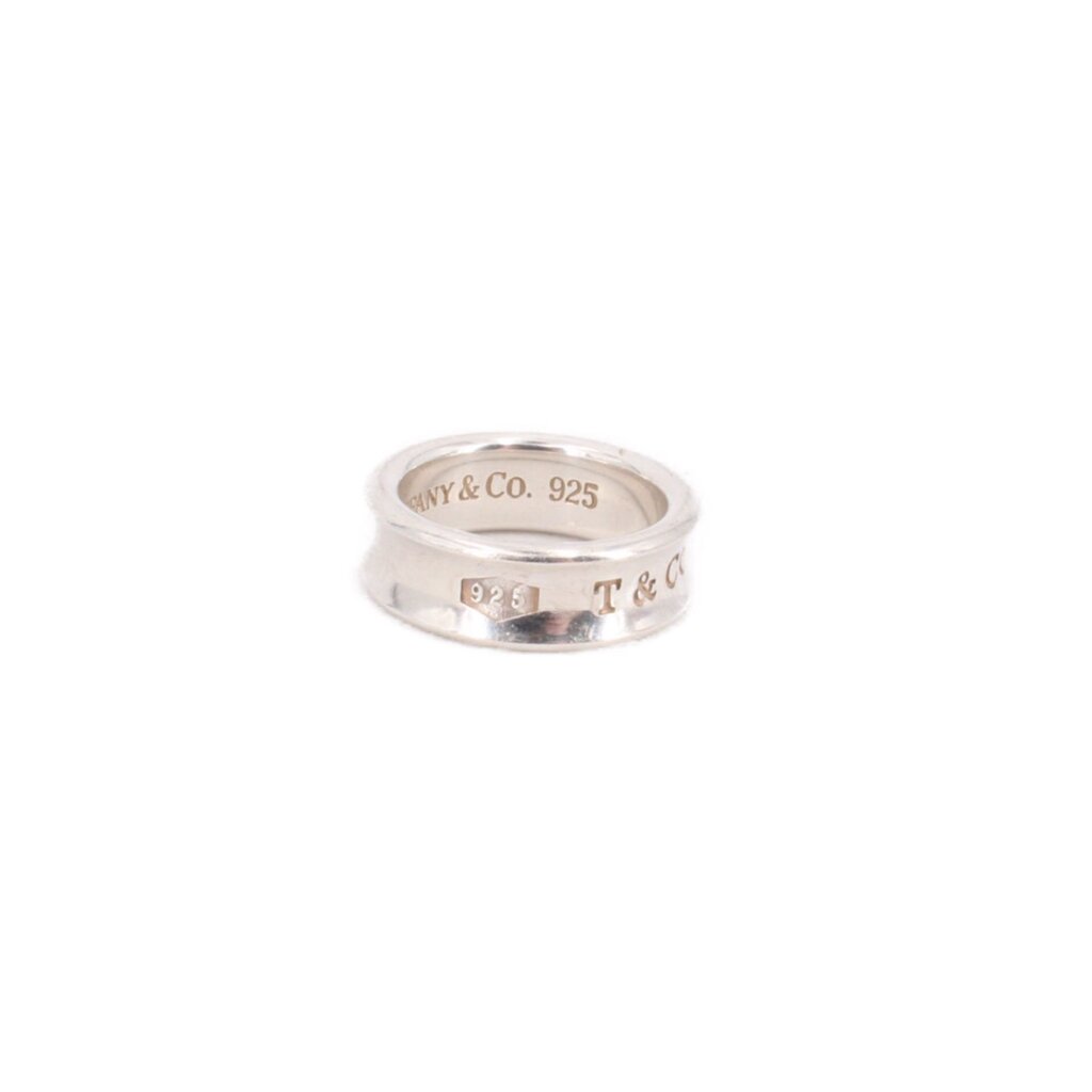 Sterling silver band ring with engraved TIFFANY & Co 925, slim profile