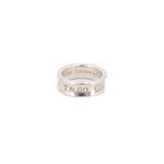 Sterling silver ring band with stacked engraved TIFFANY & Co marks