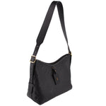 Black monogram shoulder bag with adjustable strap, front zip and gold-tone hardware