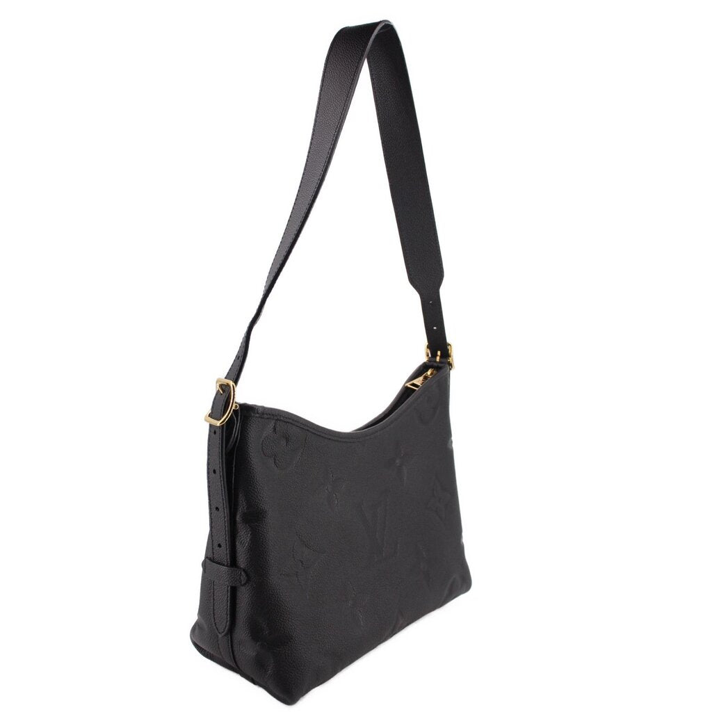 Black monogram shoulder bag with adjustable strap and front flap detail