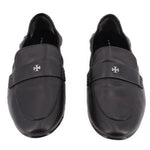 Black leather loafers with round-toe vamp, stitched seams, and logo emblem