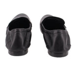 Black leather loafers with low stacked heel and stitched heel seams