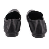 Black leather loafers with low stacked heel and stitched heel seams